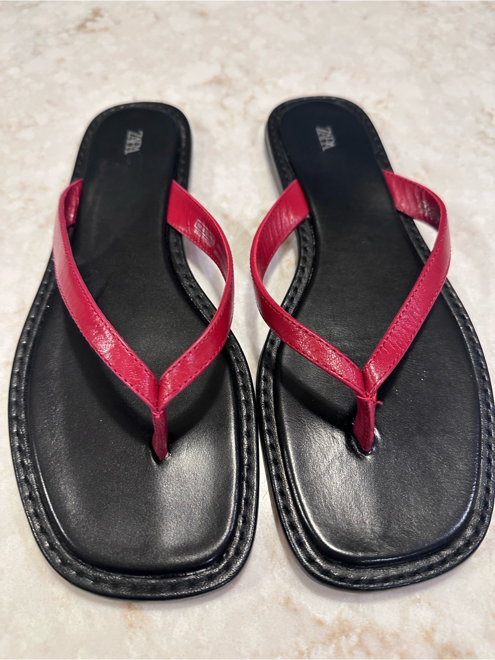 Zara red leather flip flops with square toe.
